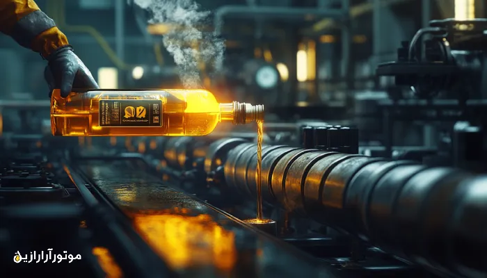 تکنسین نیروگاه در حال افزودن روغن توربین طلایی‌رنگ به سیستم توربین