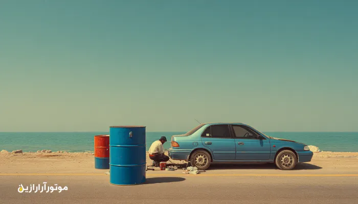 خودرو سواری در مسیر ساحلی هندیجان هنگام بررسی روغن موتور با حضور بشکه آبی موتورازین