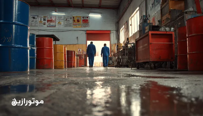 کارکنان در حال اجرای اصول 5S در اتاق روغن صنعتی با درامهای رنگکُد و محیط تمیز.طراحی اتاق روغن استاندارد: 5S، فیلتراسیون، رنگکُد